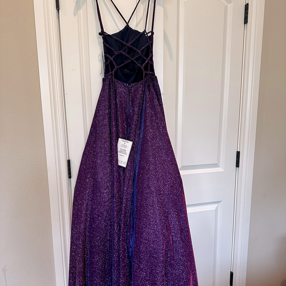 Floor length sparkly purple strappy prom or homecoming dress
